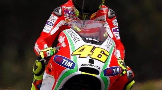 epa03206090 Italian MotoGP rider Valentino Rossi of the Ducati Team in action during the first second training session for the Motorcycling Grand Prix of Portugal at Estoril circuit, near Lisbon, Portugal, 04 May 2012. The Motorcycling Grand Prix of Portugal will take place on 06 May 2012. EPA/NUNO VEIGA