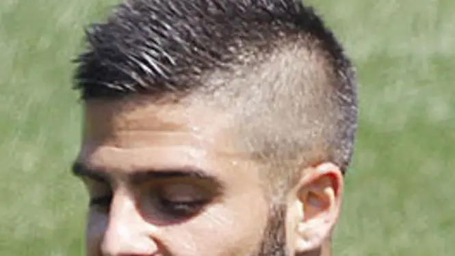 Italy's Lorenzo Insigne, right, and Christian Maggio warms up during a training session in Coverciano training complex, in Florence, Italy, Wednesday, May 21, 2014. The Azzurri will train for three days this week then resume full-time preparation next Monday. In Brazil, Italy is in Group D with England, Uruguay and Costa Rica. (AP Photo/Fabrizio Giovannozzi)