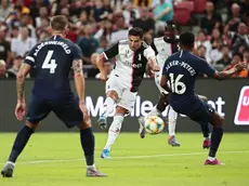 epa07731418 Juventus' Cristiano Ronaldo (C) in action against Tottenham players Toby Alderweireld (L) and Kyle Walker-Peters (R) during the International Champions Cup (ICC) soccer match between Juventus FC and Tottenham Hotspur at the National Stadium in Singapore, 21 July 2019. EPA/WALLACE WOON