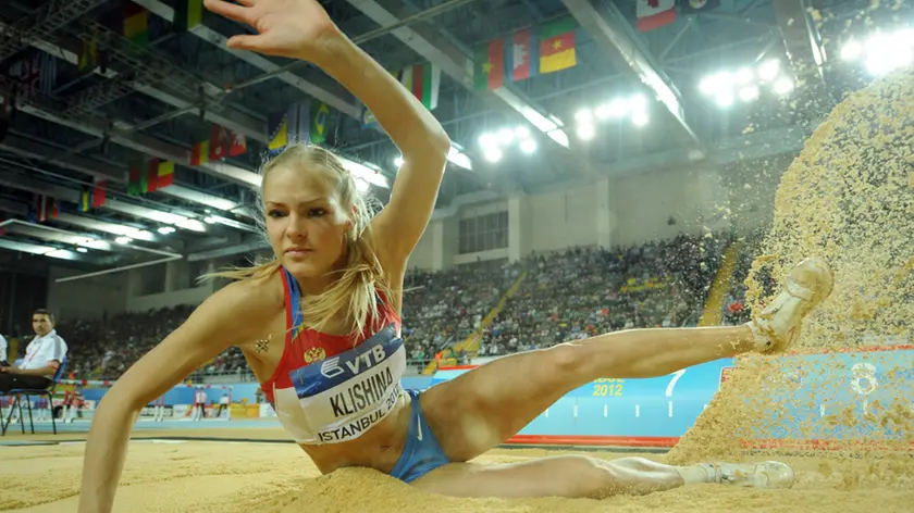 Russia's Darya Klishina competes during the women's long jump final at the 2012 IAAF World Indoor Athletics Championships at the Atakoy Athletics Arena in Istanbul on March 11, 2012. AFP PHOTO / ADRIAN DENNIS (Photo credit should read ADRIAN DENNIS/AFP/Getty Images)