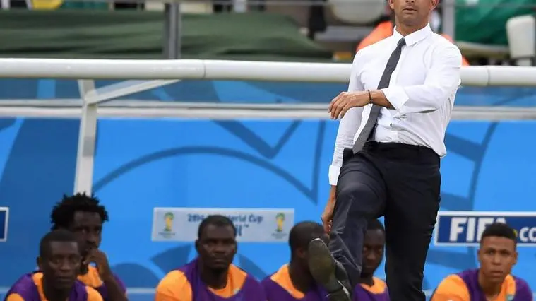 epa04278822 Ivory coast coach Sabri Lamouchi reacts during the FIFA World Cup 2014 group C preliminary round match between Greece and the Ivory Coast at the Estadio Castelao in Fortaleza, Brazil, 24 June 2014. (RESTRICTIONS APPLY: Editorial Use Only, not used in association with any commercial entity - Images must not be used in any form of alert service or push service of any kind including via mobile alert services, downloads to mobile devices or MMS messaging - Images must appear as still images and must not emulate match action video footage - No alteration is made to, and no text or image is superimposed over, any published image which: (a) intentionally obscures or removes a sponsor identification image; or (b) adds or overlays the commercial identification of any third party which is not officially associated with the FIFA World Cup) EPA/GEORGI LICOVSKI EDITORIAL USE ONLY