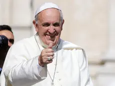 Pope Francis greets the faithful as he arrives to lead his general audience in Saint Peter's Square, Vatican City, 18 June 2014.ANSA/ FABIO FRUSTACI