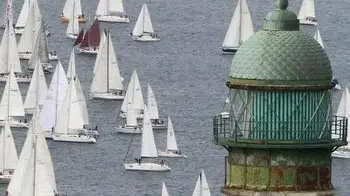 Un'immagine della partenza della 44/a edizione della regata Barcolana nello specchio di mare prospiciente il Faro della Vittoria, 14 ottobre 2012 a Trieste. .More than 1,700 yachts convene in the Gulf of Trieste (northern Italy) fort the 44/th edition of the Barcolana Sail Race, 14 October 2012. The spectacular annual race is the largest sailing event in Europe and the only regatta in the world to set a single start line for so many yachts. .ANSA/ANDREA LASORTE