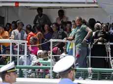 Migrants disembark from the Spanish ship 'Rio Segura' in the harbour of Salerno, Italy, 29 June 2017. About 1216 migrants, including children, were rescued while attempting to cross the Mediterranean. ANSA/CIRO FUSCO .