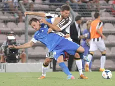 Maurizio Domizzi (R) of Udinese and Michael Rabusic of Slovan Liberec in action during the Uefa Europa League play-off first leg soccer match Udinese Calcio vs FC Slovan Liberec at Nereo Rocco stadium in Trieste, Italy, 22 August 2013. ANSA/ANDREA LASORTE