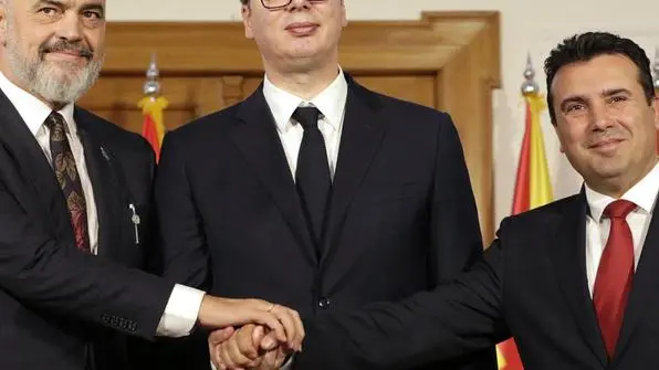 epa07909576 Serbian President Aleksandar Vucic (C), Albanian Prime Minister Edi Rama (L) and North Macedonian Prime Minister Zoran Zaev (R) shake hands after the press conference after the Serbia, North Macedonia and Albania high level trilateral meeting in Novi Sad, Serbia, 10 October 2019. The formation of a so-called 'small Schengen area' - aimed at facilitating a more free flow of goods, people and services - tops the meeting's agenda. EPA/ANDREJ CUKIC