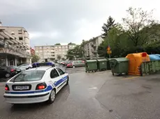 Prizorisce umora pri smeteh za centralno stavbo od Telekoma