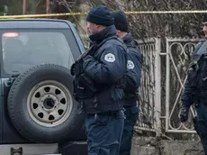 epa06443277 Police guards at the sealed-off crime scene where Oliver Ivanovic, the former State Secretary for Kosovo and Metohija and a subject of a controversial war crimes trial and retrial, was shot in Mitrovica, Serbia, 16 January 2018. The prominent Ivanovic was shot in front of his office in Mitrovica, Kosovo, 16 January 2018, according to media reports. EPA/STRINGER