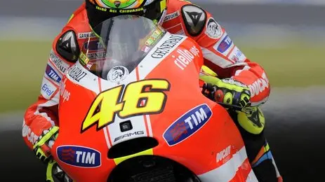 epa02943525 Italian MotoGP rider Valentino Rossi powers his Ducati during the third practice session of the Motorcycle Grand Prix of Japan at the Twin Ring Motegi circuit in Motegi, north of Tokyo, Japan, 01 October 2011. The Grand Prix of Japan will take place on 02 October. EPA/FRANCK ROBICHON