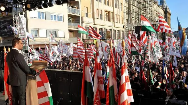 epa03146203 Chairman of the radical nationalist party For A Better Hungary Movement 'Jobbik' Gabor Vona delivers his speech during his party's commemoration on the 164th anniversary of the outbreak of the 1848 revolution and war of independence against the Habsburg rule, Budapest, Hungary, 15 March 2012. Competing rallies supporting and condemning the government of Hungarian Prime Minister Viktor Orban dominated the country's National Day celebrations in Budapest. In a speech to his supporters outside the parliament building, Orban also made thinly veiled jibes at attempts by the European Union to force it to change new laws affecting the judiciary, central bank and data protection. EPA/TAMAS KOVACS HUNGARY OUT